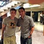 Danny Karbassiyoon poses with Lionel Messi in Camp Nou