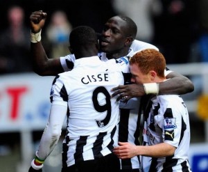 Newcastle forward Papiss Cisse celebrates his winning goal with Moussa Sissoko and Adam Campbell (Google Creative Commons)